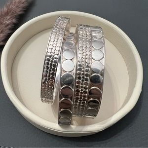 Anna Beck Set of 4 Sterling Silver Bangles.
